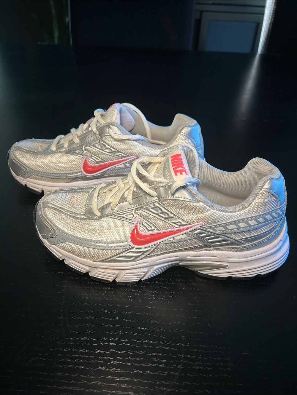 Nike Women’s Silver Athletic Sneakers with Pink Swoosh